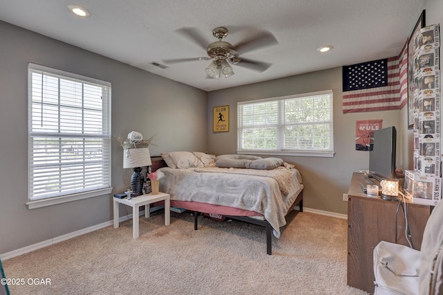 bedroom with carpet, baseboards, recessed lighting, and a ceiling fan