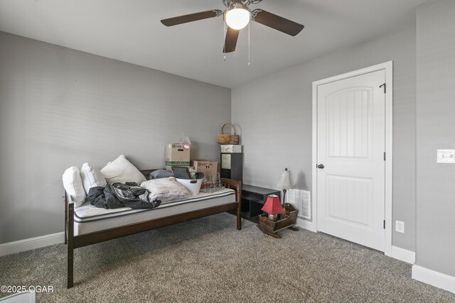 bedroom featuring carpet floors, baseboards, and a ceiling fan