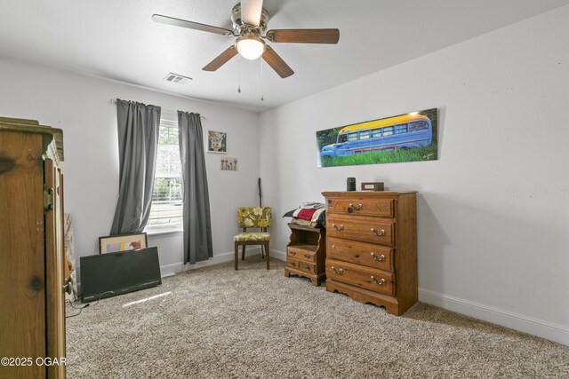 bedroom featuring carpet, baseboards, and ceiling fan