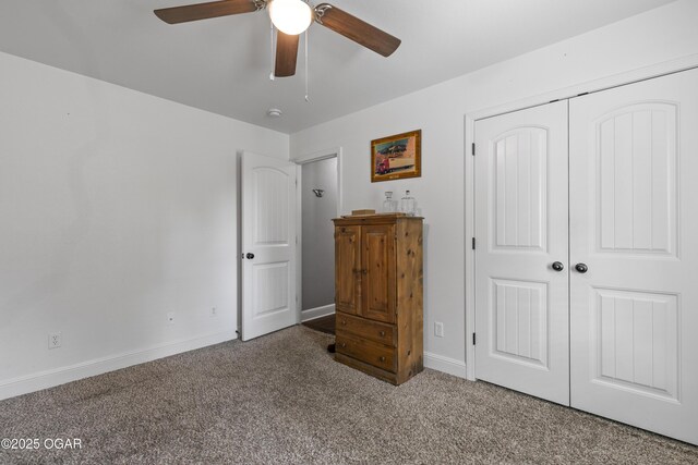 bedroom featuring carpet flooring, a closet, baseboards, and ceiling fan