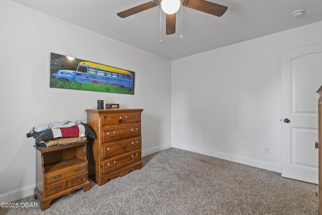 bedroom with carpet, baseboards, and ceiling fan