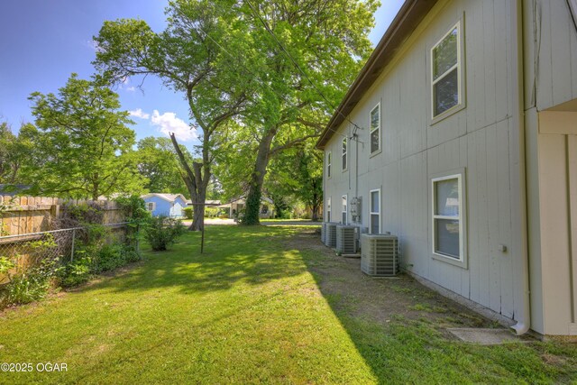 238 E 21st St, Baxter Springs, KS 66713 - view of yard featuring central air condition unit
