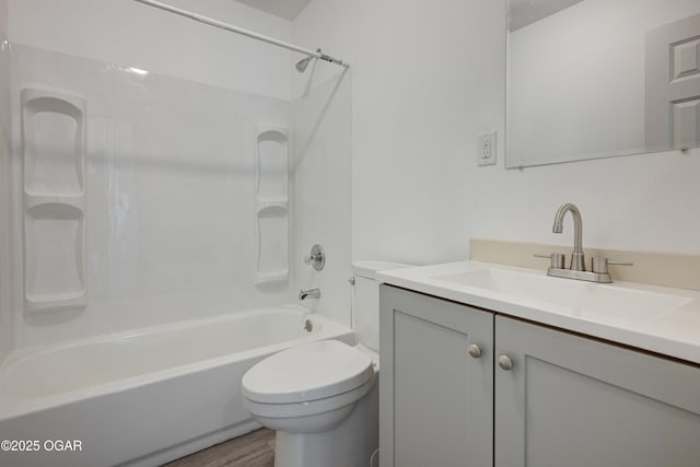 238 E 21st St, Baxter Springs, KS 66713 - full bathroom with toilet, tub / shower combination, vanity, and wood finished floors
