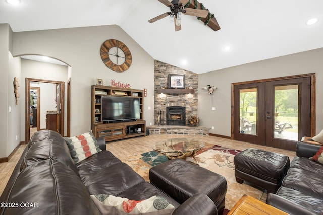 12244 County Rd 227, Oronogo, MO 64855 - living area with a ceiling fan, light wood finished floors, french doors, arched walkways, and recessed lighting