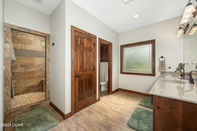 12244 County Rd 227, Oronogo, MO 64855 - full bath featuring a stall shower, baseboards, and wood finished floors