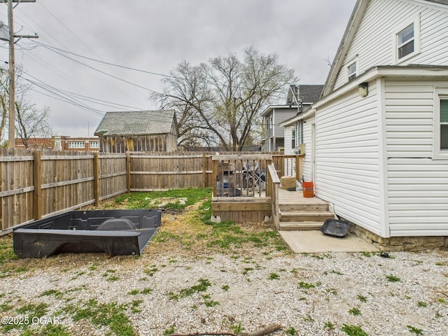 720 Chestnut Ave, Joplin, MO 64801 - fenced backyard featuring a deck