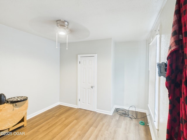 720 Chestnut Ave, Joplin, MO 64801 - spare room featuring wood finished floors, a ceiling fan, and baseboards