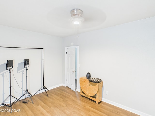 720 Chestnut Ave, Joplin, MO 64801 - misc room featuring a ceiling fan, light wood finished floors, and baseboards