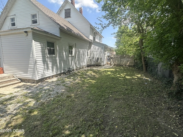 720 Chestnut Ave, Joplin, MO 64801 - view of home's exterior with a shingled roof and a chimney
