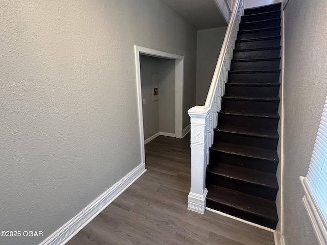 720 Chestnut Ave, Joplin, MO 64801 - stairway with wood finished floors, baseboards, and a textured wall