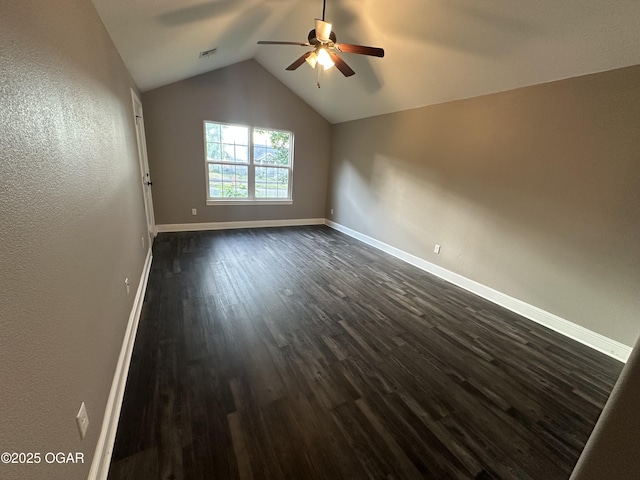 216 N Connor Ave, Joplin, MO 64801 - unfurnished room featuring ceiling fan, dark wood-type flooring, lofted ceiling, and baseboards
