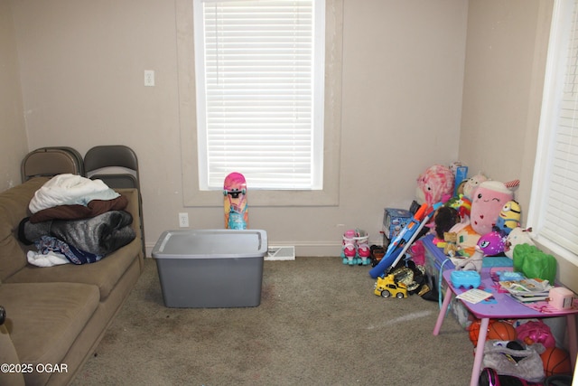 504 E Jackson St, Pittsburg, KS 66762 - game room with carpet floors and baseboards