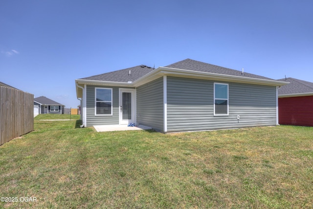 414 Eagle Edge Ave, Duenweg, MO 64841 - rear view of house featuring a lawn, a patio area, and a shingled roof