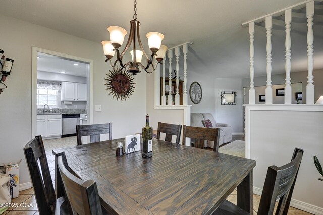 1912 N Duquesne Rd, Joplin, MO 64801 - dining area with a chandelier and baseboards