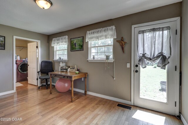 1912 N Duquesne Rd, Joplin, MO 64801 - office space featuring washer / clothes dryer, baseboards, and light wood-type flooring