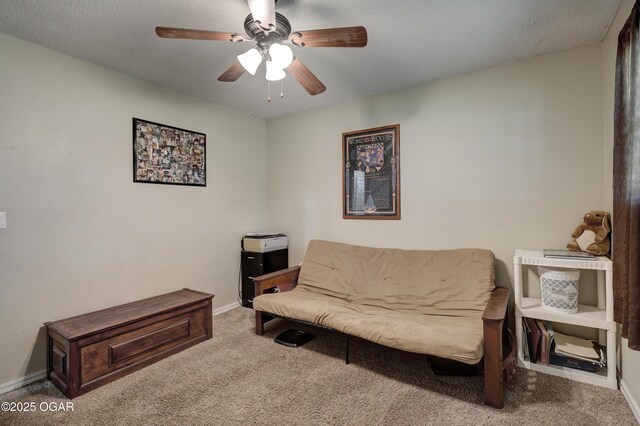1912 N Duquesne Rd, Joplin, MO 64801 - sitting room featuring carpet flooring, ceiling fan, and baseboards