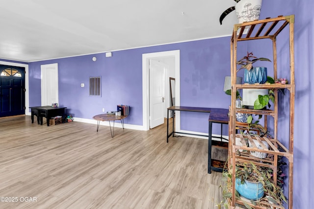 1815 S Empire Ave, Joplin, MO 64801 - living area featuring wood finished floors and baseboards