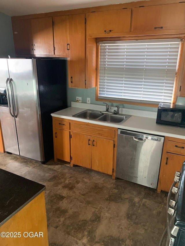 2803 S Missouri, Joplin, MO 64804 - kitchen featuring stainless steel appliances, a sink, and light countertops