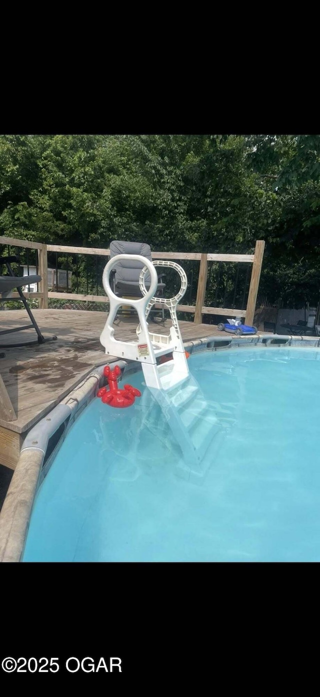 811 N Elloitt St, Webb City, MO 64870 - view of swimming pool with a deck