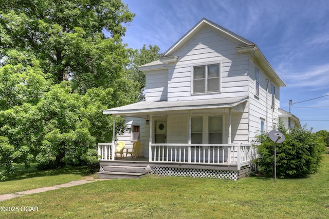 1712 E Broadway St, Joplin, MO 64801 - view of front of house with covered porch and a front lawn