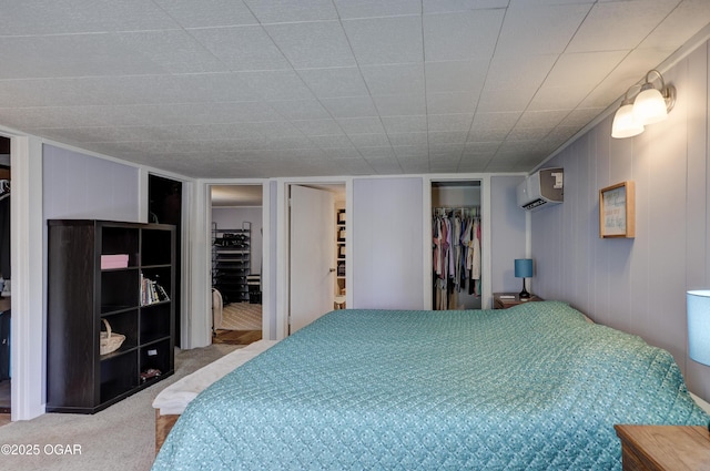 1712 E Broadway St, Joplin, MO 64801 - carpeted bedroom with a wall unit AC and a walk in closet
