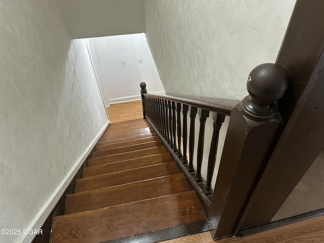 1712 E Broadway St, Joplin, MO 64801 - stairs with hardwood / wood-style flooring and baseboards