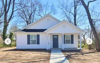 1403 E Valley St, Joplin, MO 64801 - view of front of home featuring a porch