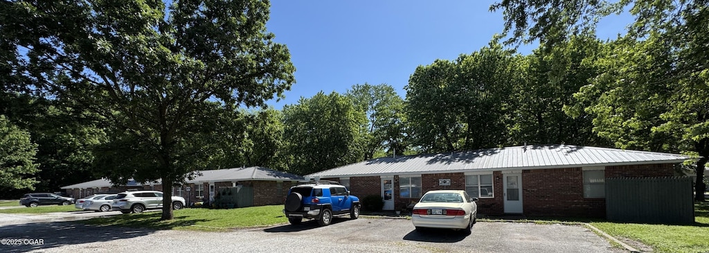 1822-1826 Maple St, Seneca, MO 64865 - ranch-style house with brick siding and a front lawn