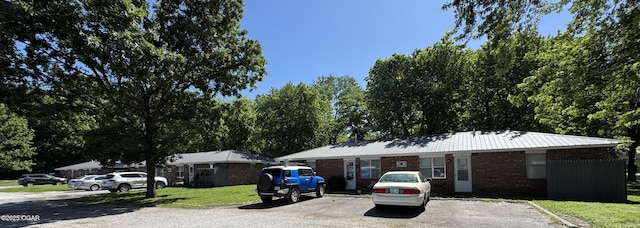 1822-1826 Maple St, Seneca, MO 64865 - ranch-style house with brick siding and a front lawn