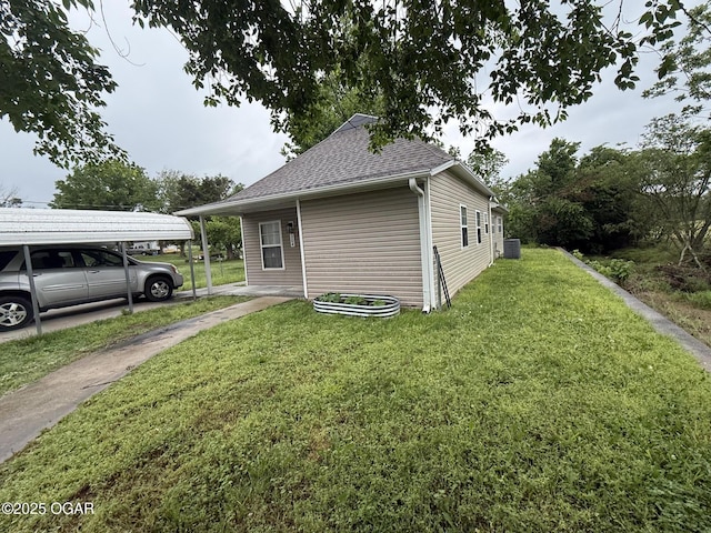 304 Market St, Wentworth, MO 64873 - view of property exterior featuring a shingled roof, a yard, and central AC unit
