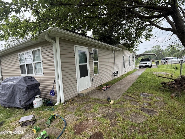 304 Market St, Wentworth, MO 64873 - view of home's exterior with a carport