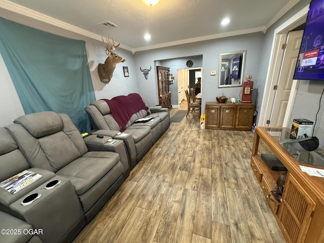 304 Market St, Wentworth, MO 64873 - living area with wood finished floors, ornamental molding, and recessed lighting