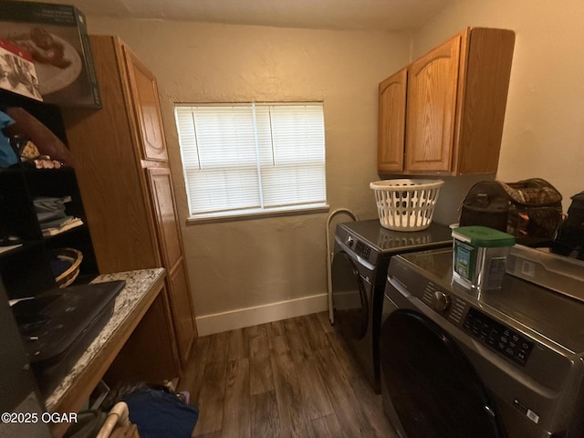 304 Market St, Wentworth, MO 64873 - laundry room featuring dark wood-style floors, cabinet space, washer and dryer, and baseboards