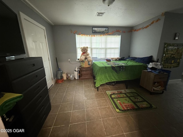 304 Market St, Wentworth, MO 64873 - bedroom with dark tile patterned flooring