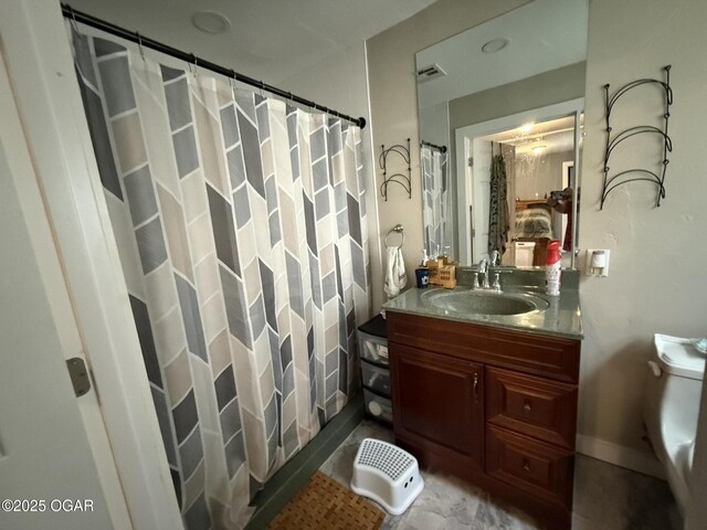 304 Market St, Wentworth, MO 64873 - bathroom with vanity, toilet, a shower with curtain, and baseboards