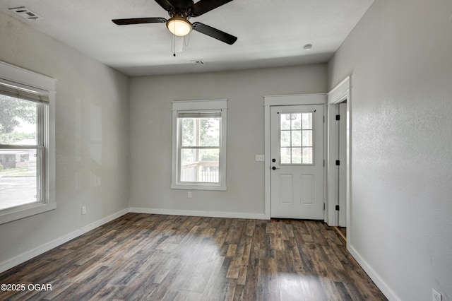 328 N Connor Ave, Joplin, MO 64801 - foyer with dark wood-style floors, a ceiling fan, and baseboards