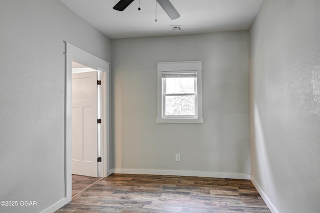 328 N Connor Ave, Joplin, MO 64801 - empty room featuring ceiling fan, wood finished floors, and baseboards