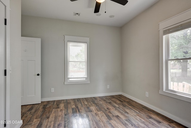 328 N Connor Ave, Joplin, MO 64801 - spare room featuring plenty of natural light, a ceiling fan, wood finished floors, and baseboards