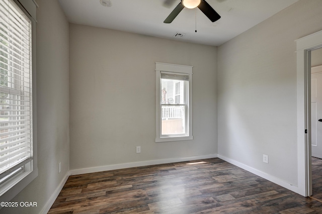 328 N Connor Ave, Joplin, MO 64801 - unfurnished room featuring a ceiling fan, dark wood-style floors, and baseboards
