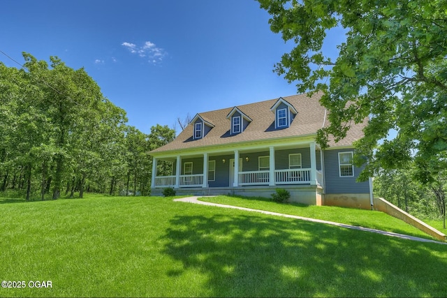 1601 S Outer Rd, Joplin, MO 64804 - cape cod home with a porch, a front yard, and a shingled roof