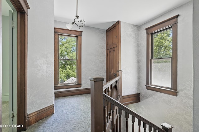 524 W 5th St, Joplin, MO 64801 - hall featuring carpet flooring, an upstairs landing, and baseboards