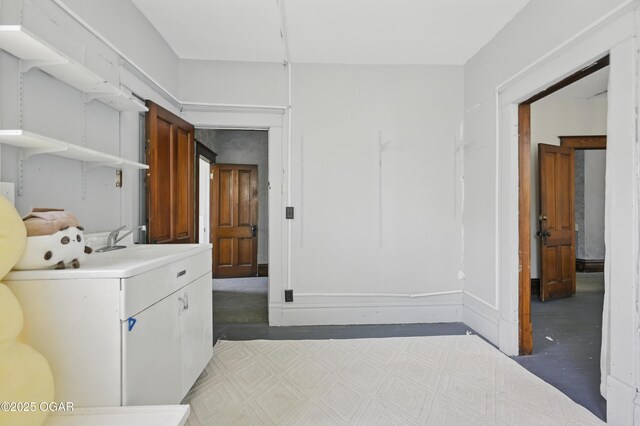 524 W 5th St, Joplin, MO 64801 - laundry area featuring a sink