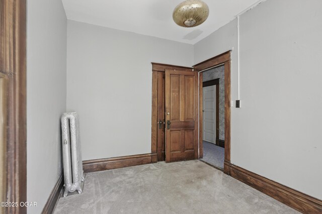 524 W 5th St, Joplin, MO 64801 - unfurnished room with carpet flooring and baseboards
