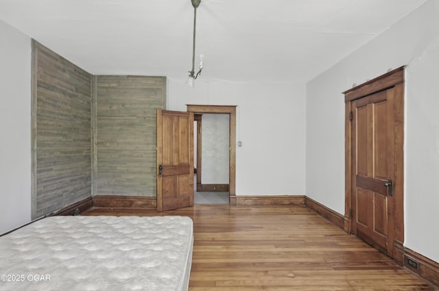 524 W 5th St, Joplin, MO 64801 - unfurnished room featuring wood finished floors and baseboards
