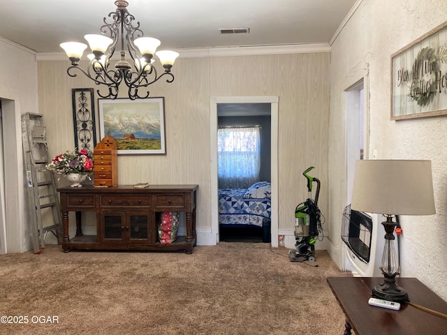 1017 E Broadway St, Joplin, MO 64801 - living area featuring a chandelier, carpet, ornamental molding, and heating unit