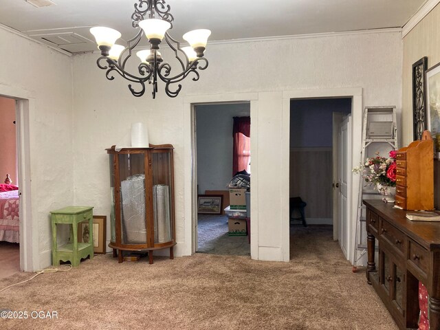 1017 E Broadway St, Joplin, MO 64801 - carpeted dining space featuring a chandelier