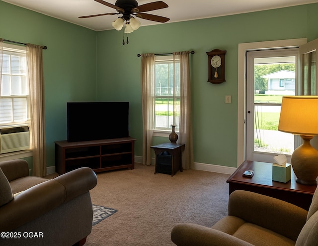 1017 E Broadway St, Joplin, MO 64801 - living room with plenty of natural light, ceiling fan, carpet floors, and cooling unit