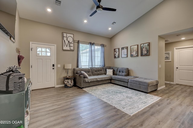 2615 E Xenia St, Joplin, MO 64801 - living room with a ceiling fan, baseboards, light wood finished floors, high vaulted ceiling, and recessed lighting
