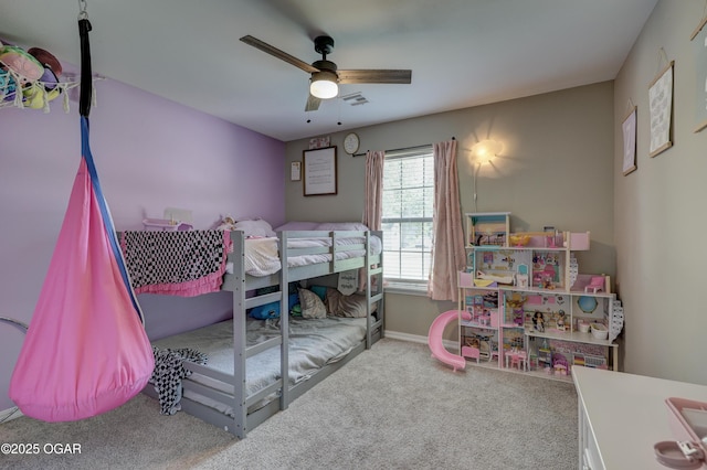 2615 E Xenia St, Joplin, MO 64801 - carpeted bedroom featuring a ceiling fan and baseboards