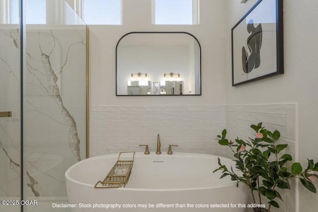 1713 E White Oak St, Joplin, MO 64801 - bathroom with a freestanding tub